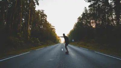 Road, skateboarder