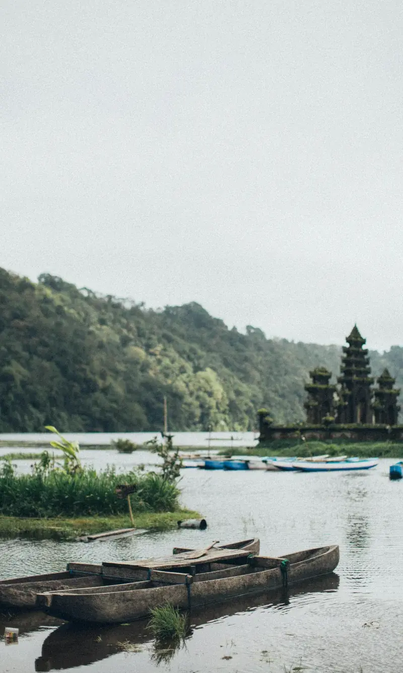 Boat on a lake with a temple