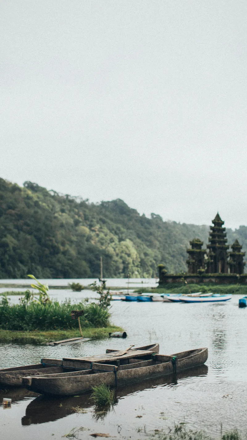Boat on a lake with a temple