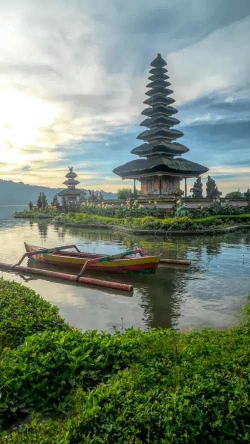 Boat on a Lake with a Temple wallpaper HD 4K for phone