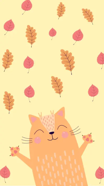 Chat mignon dans les feuille d'automne