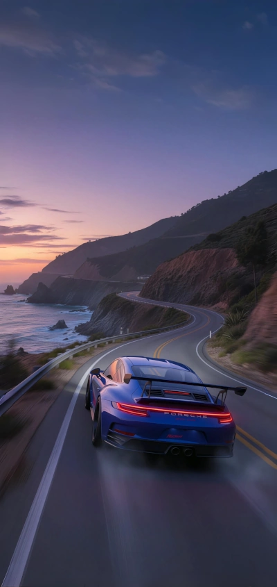 Porsche 911 GT3 coastal road at dusk