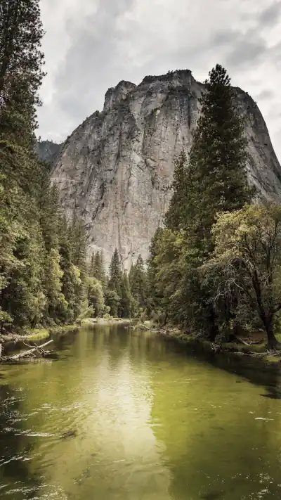 Photograph of a rocky mountain with a lake