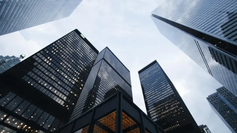 Modern skyscrapers under a cloudy sky