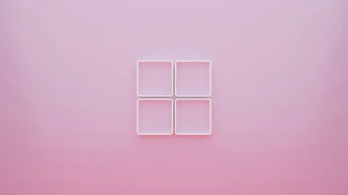 Minimalist Windows 11 logo on a pink background