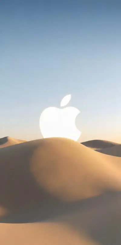 Logo Apple sur dunes de sable