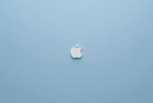 Minimalist Apple logo on a blue background wallpaper HD 4K for desktop