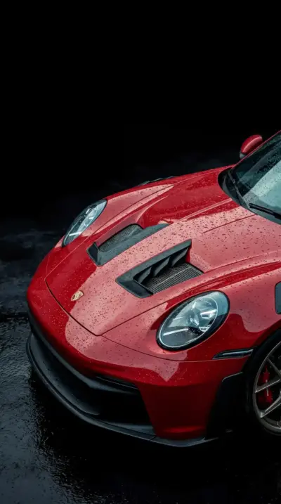 Porsche 911 GT3 RS rouge sous la pluie