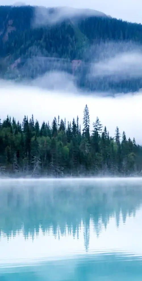 Blue lake and mountain forest in the fog wallpaper HD 4K for phone