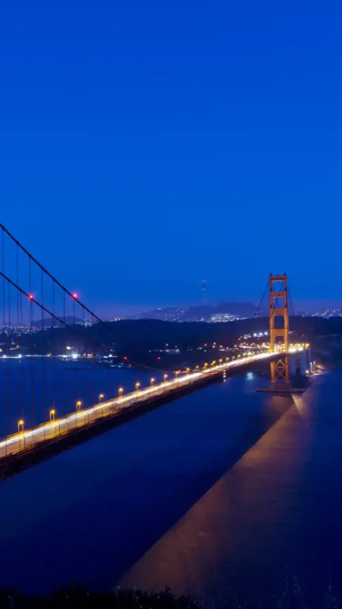 Golden Gate Bridge background at night with streetlights wallpaper HD 4K for phone