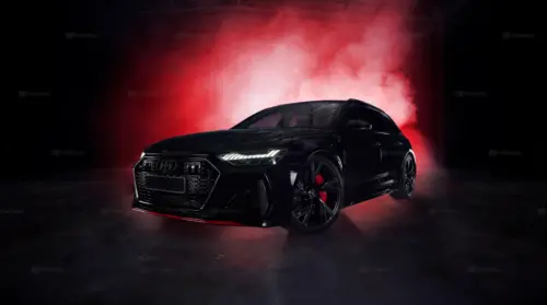 Black Audi RS6 against a backdrop of red smoke