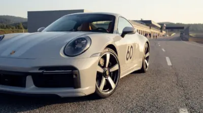 Grey Porsche 911 on the track