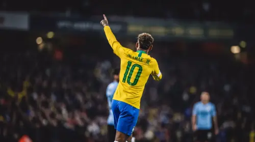 Background of Neymar Jr from behind wearing the Brazil jersey wallpaper HD 4K for desktop