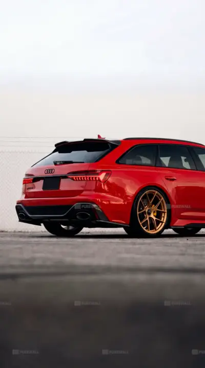 Red Audi RS6 with bronze rims