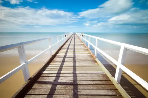 Wooden jetty on a paradise beach wallpaper HD 4K for desktop
