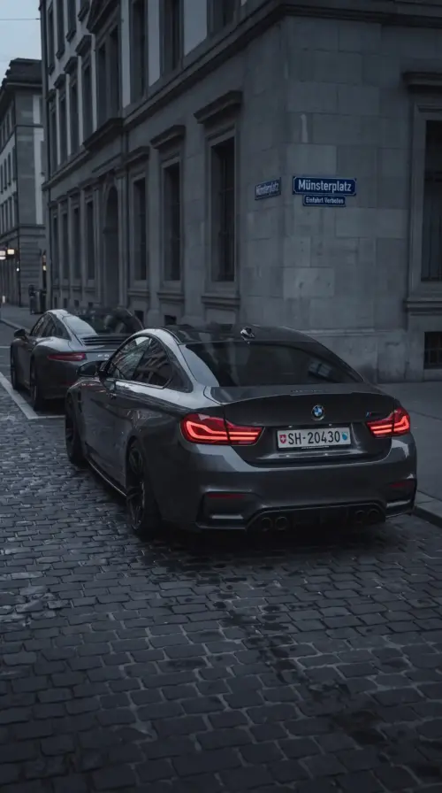 Grey BMW M4 on a cobblestone street