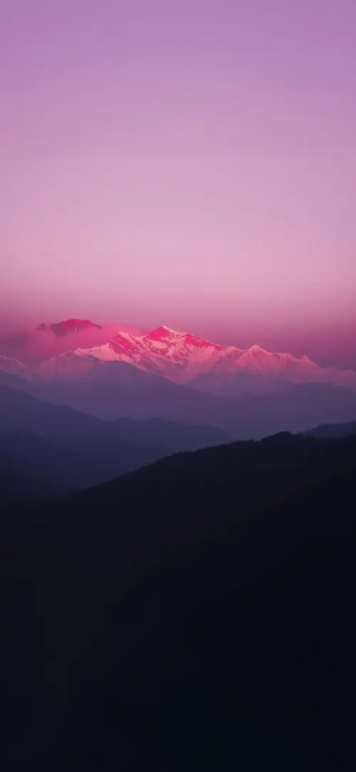 Paysage montagnes enneigées sous un ciel rose fonds d’écran HD 4K pour téléphone