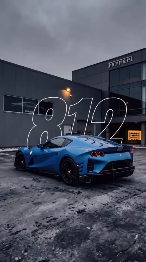 Blue Ferrari 812 in front of the showroom