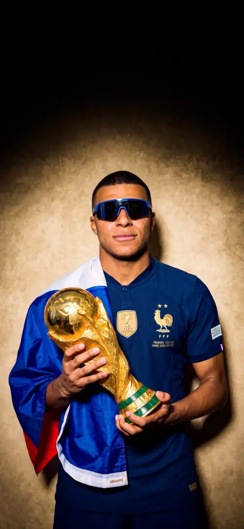 Kylian Mbappé with the World Cup