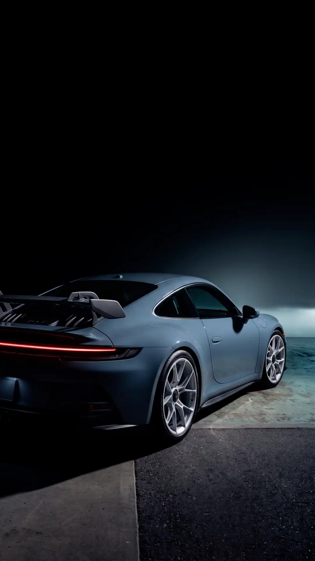 Grey Porsche 911 background in a dark setting wallpaper HD 4K for phone